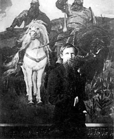 Виктор Михайлович Васнецов у своей картины «Богатыри». 1898 год